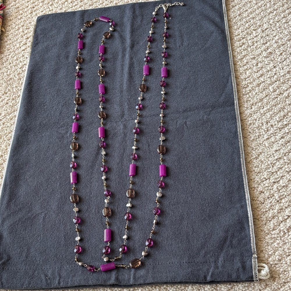 Elegant Purple and Brown Beaded Necklace
70 inches long.